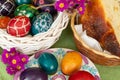 Easter eggs with flowers - green background