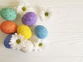 Easter eggs flowers on white wooden decorated Royalty Free Stock Photo