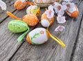 Easter eggs with flowers on wood