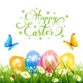 Easter eggs on grass and butterflies Royalty Free Stock Photo