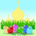 Easter eggs with grass and church domes.