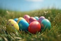 Easter eggs on a grass in front of a field Royalty Free Stock Photo