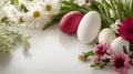 Easter eggs, grass and wild flowers border on white Royalty Free Stock Photo