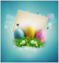 Easter eggs in green grass with white flowers, butterflies, vintage card Royalty Free Stock Photo