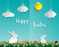 Easter eggs on green grass with white rabbit,little daisy,butterfly,cloud and sun on soft blue background,paper art style Royalty Free Stock Photo