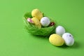 Easter eggs in a green nest.