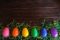 Easter eggs on green paper grass Royalty Free Stock Photo