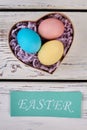 Easter eggs, heart shaped box. Royalty Free Stock Photo