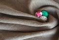 Easter eggs lie on sacking Royalty Free Stock Photo