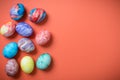 Easter eggs on a Living Coral background