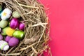 Easter eggs in nest on red