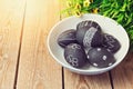 Easter eggs painted with chalkboard paint on wooden background