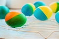 Easter eggs painted by hand yellow and blue lie on the lattice Royalty Free Stock Photo