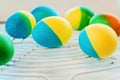 Easter eggs painted by hand yellow and blue lie on the lattice Royalty Free Stock Photo