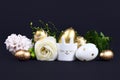 Easter eggs painted with metallic golden and white stripes and dots and cute easter egg cup in shape of bunny Royalty Free Stock Photo