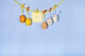 Easter Eggs and paper on a rope Royalty Free Stock Photo