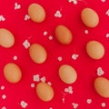 Easter eggs pattern with hydrangea flowers on red background