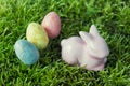 Easter eggs with porcelein rabbit bunny on green moss