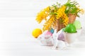 Easter eggs with rabbit and branch mimosa Royalty Free Stock Photo