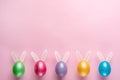 Easter eggs with rabbit ears. Flat lay. View from above Royalty Free Stock Photo