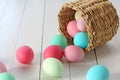 Easter Eggs Rolling Out of a Basket Royalty Free Stock Photo
