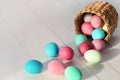 Easter Eggs Rolling Out of a Basket Royalty Free Stock Photo