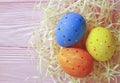 Easter eggs rustic straw,background vintage unique wooden pink space springtime festive april, card Royalty Free Stock Photo