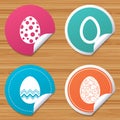 Easter eggs signs. Circles and floral patterns.