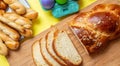 Easter eggs and tsoureki braid, greek easter sweet bread, on wood Royalty Free Stock Photo