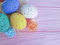 Easter eggs flowers on blue wooden pattern springtime Royalty Free Stock Photo