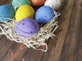 Easter eggs straw wooden season Royalty Free Stock Photo