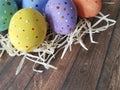 Easter eggs straw wooden