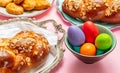 Easter eggs and tsoureki braid, greek easter sweet bread Royalty Free Stock Photo