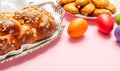 Easter eggs and tsoureki braid, greek easter sweet bread Royalty Free Stock Photo