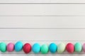Easter Eggs on White Wooden Planks Royalty Free Stock Photo