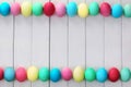 Easter Eggs on White Wooden Planks Royalty Free Stock Photo