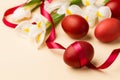 Easter eggs in the whitish nest and white flowers Royalty Free Stock Photo