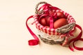 Easter eggs in the whitish nest and white flowers Royalty Free Stock Photo