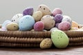 Easter eggs in a wicker basket Royalty Free Stock Photo