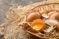 Easter eggs in a Wicker basket with straw Royalty Free Stock Photo