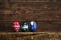 Easter eggs on wooden background. Easter eggs in the basket of wooden boards Royalty Free Stock Photo