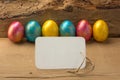 Easter eggs on a wooden background. Copy space.