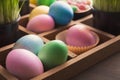 Easter eggs in wooden container Royalty Free Stock Photo