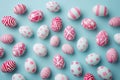 Easter Elegance: Pink and White Egg Pattern on Pastel Blue Background