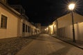 Easter European night city street paved road alley way long exposure landmark photography with old buildings and lantern Royalty Free Stock Photo