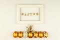 Easter festive decoration. Top view of easter eggs colored with golden paint and empty mock-up photo frame. Various dotted designs