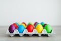 Easter festive multicolor eggs carton Royalty Free Stock Photo