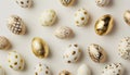 Easter festive pattern with painted golden decoration on easter eggs on white table. Top view and flat lay style Royalty Free Stock Photo
