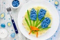 Easter festive salad Spring flowers of blue eggs