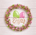 Easter Festive Twigs Wreath with Flowers on Wooden Background